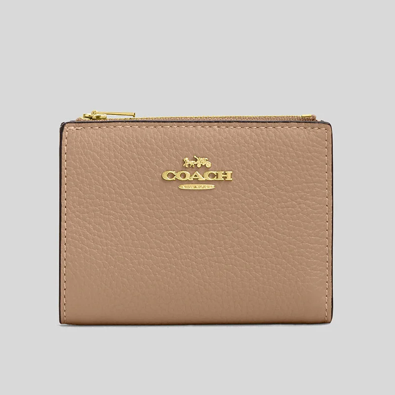 Coach bags with a front - flap pocket and a turnlock for a classic aestheticCOACH Bifold Wallet Taupe CM315