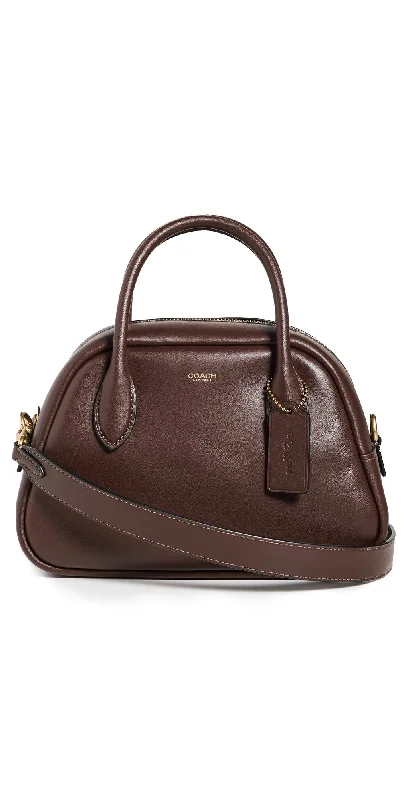 Coach Dempsey bags with a contrast - colored interior for visual interestGlovetanned Borough Bowling Bag B4/Maple One Size