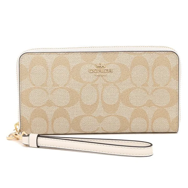 Ladies Coach Borough bags in a pastel shade for a soft and delicate appearanceCoach Ladies fc4452 Signature Round Zipper Long Wallet