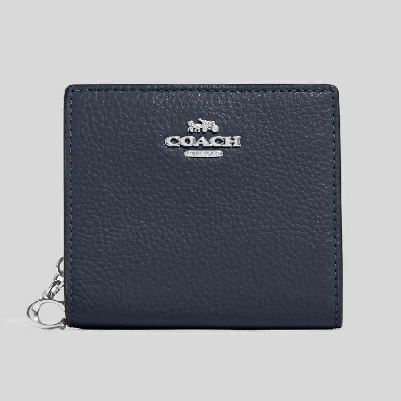 Coach Tabby bags with a classic turnlock closure for a timeless styleCOACH Snap Wallet Denim C2862