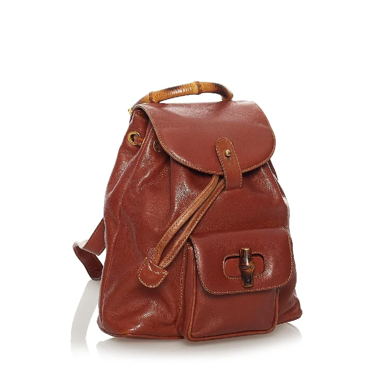 Gucci tote bags for women with a spacious interiorGucci Bamboo Drawstring Leather Backpack (34099)