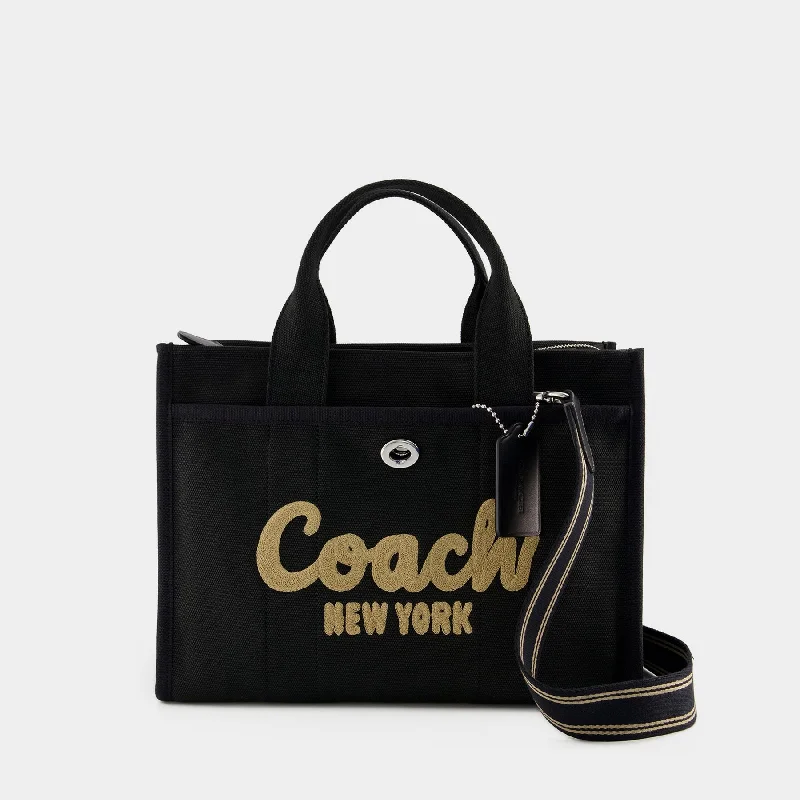 Coach handbags with a perforated leather detail for a breathable and unique designCargo Tote  - Coach - Canvas - Black