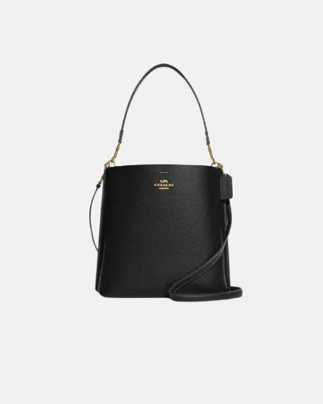 Coach Rogue bags featuring the signature C - hardware for a branded lookCoach Mollie Bucket Bag