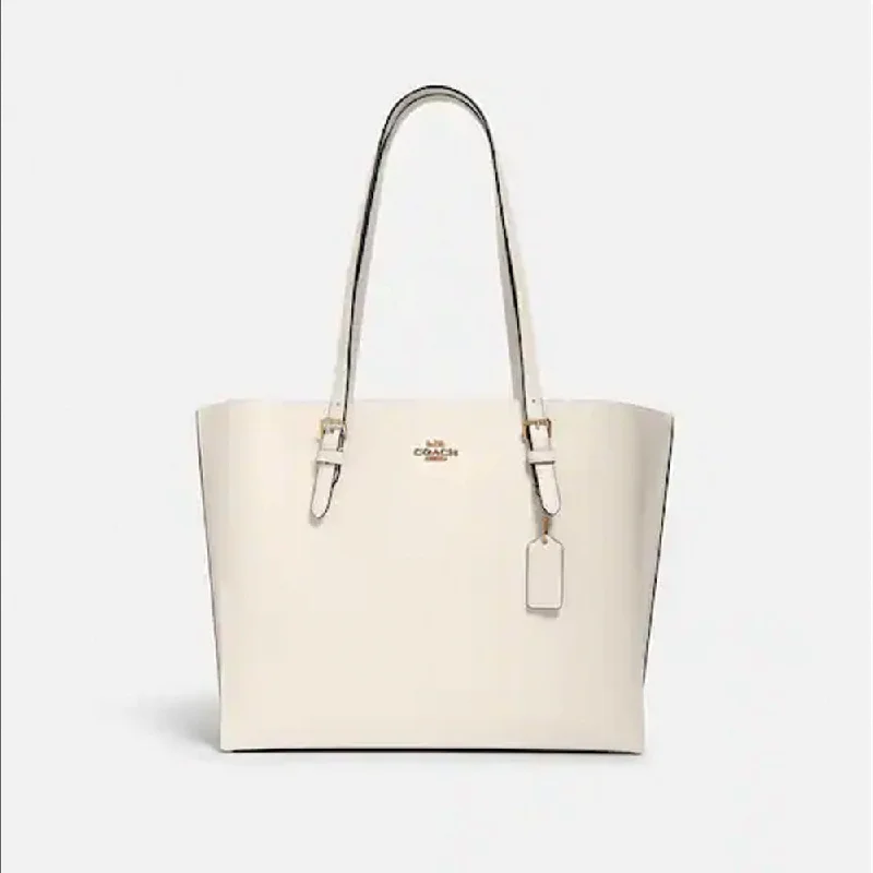 Coach Borough bags with a structured silhouette and a magnetic - snap closureCoach Mollie Tote Light Saddle