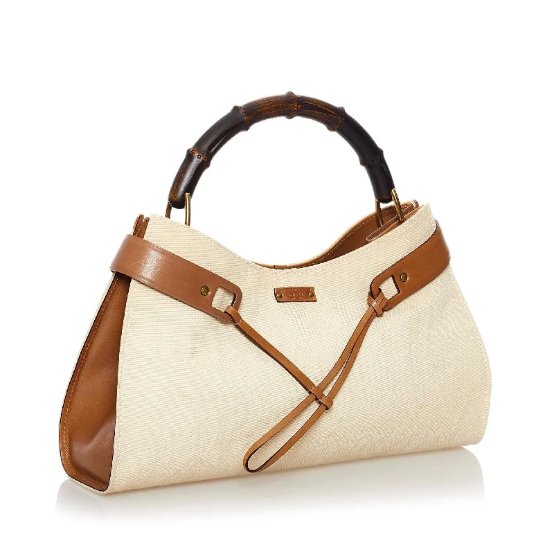 Gucci Marmont bags for women with a contrast - colored interiorGucci Bamboo Canvas Handbag (33395)