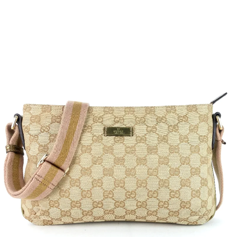 Women Gucci bags with a snap - button closure and a decorative charmGG Canvas Web Crossbody Bag