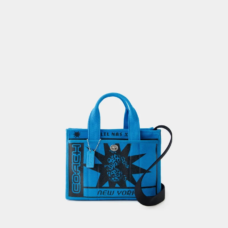 Coach crossbody bags with a printed floral pattern for a feminine touchLil Nas X Drop Cargo Tote 26 - Coach - Canvas - Blue