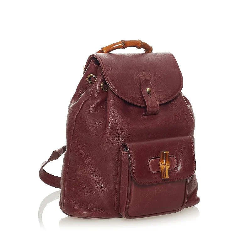 Women Gucci bags with a zippered interior pocketGucci Bamboo Drawstring Leather Backpack (27763)