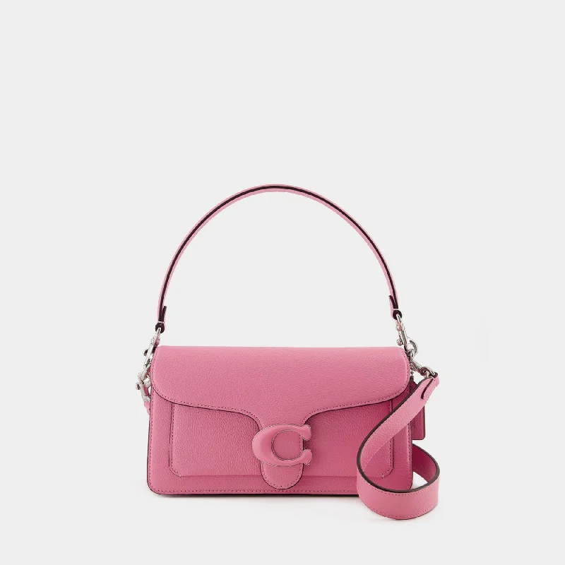 Coach tote bags with a snap - button closure and a decorative charm for styleTabby 26 Shoulder Bag - Coach - Leather - Pink