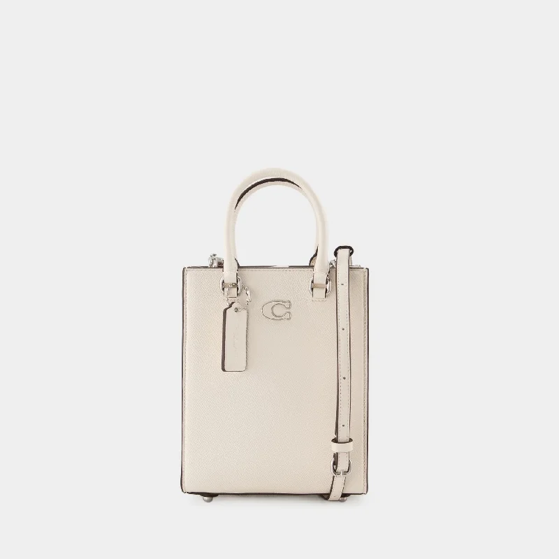 Coach bags with a detachable mobile phone holder for on - the - go useTote 16 Tote Bag - Coach - Leather - White