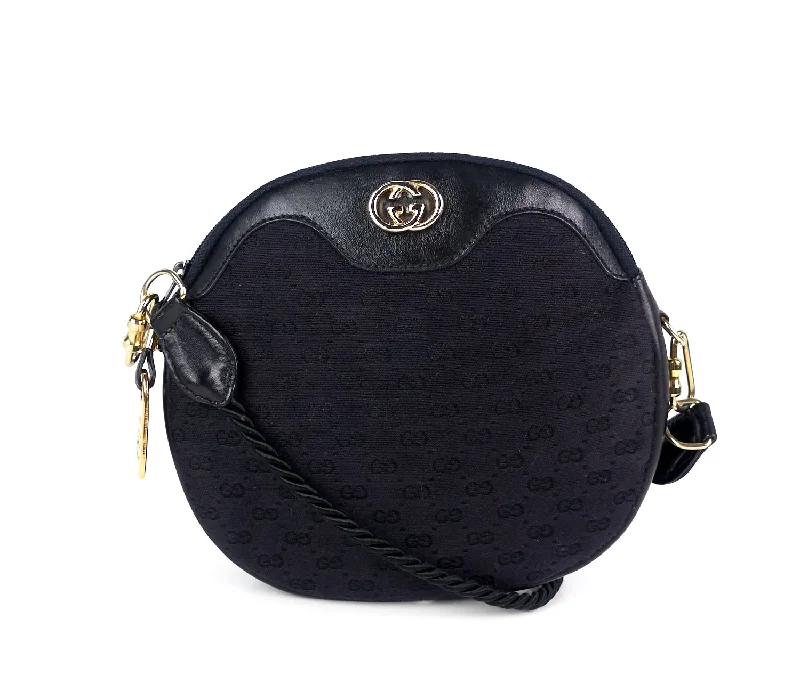 Women Gucci Sylvie bags with a leather - wrapped handleMonogram Canvas and Leather Vintage Bag