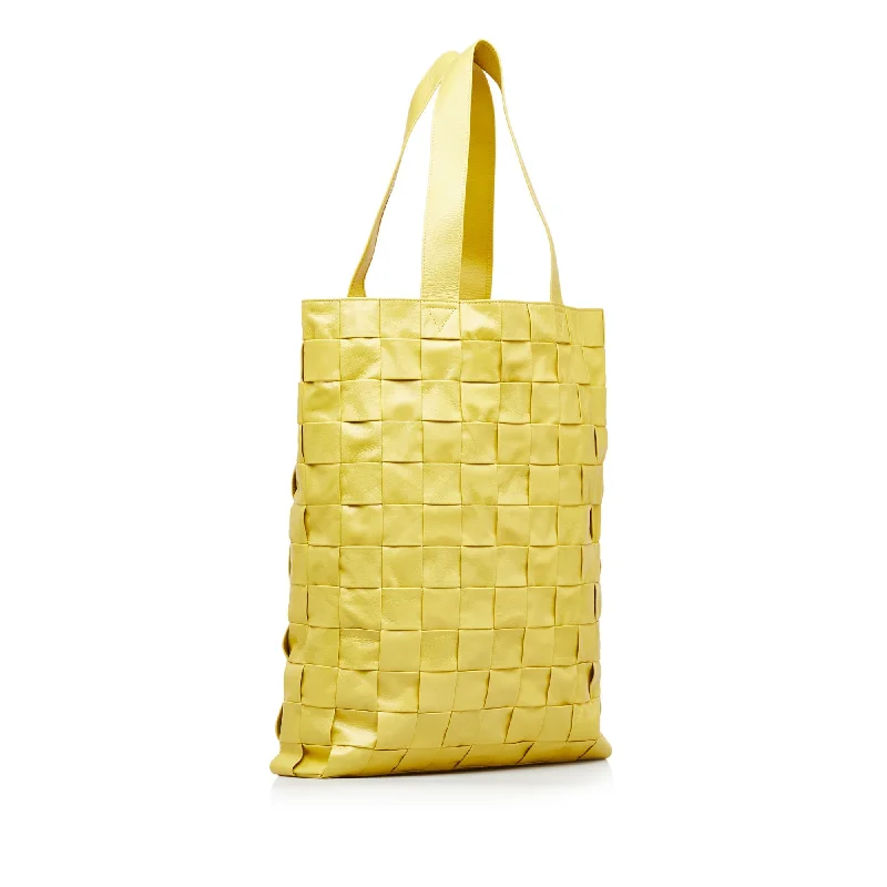 Bottega Veneta bags with quilted designsYellow Bottega Veneta Maxi Intrecciato Cassette Tote Bag