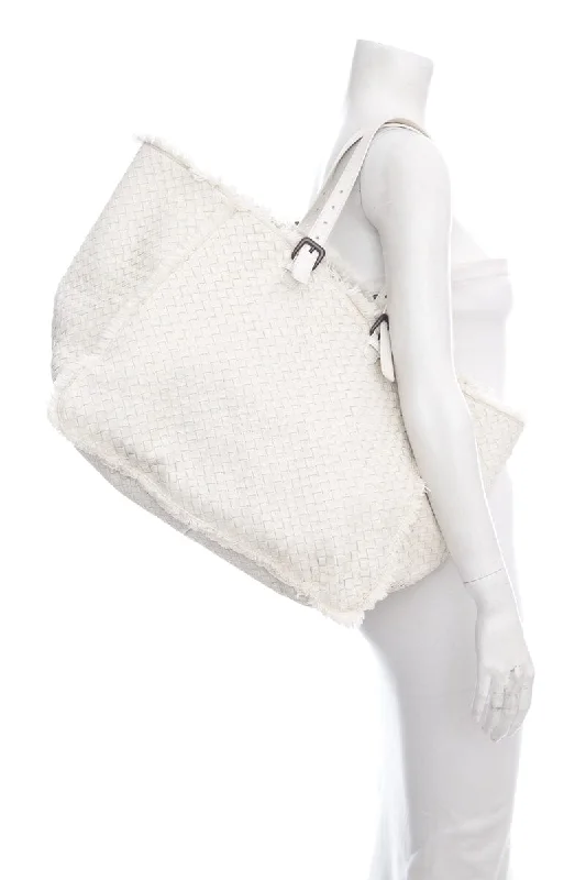 Bottega Veneta bags with fringe detailsBottega Veneta White Intrecciato Fringe Tote