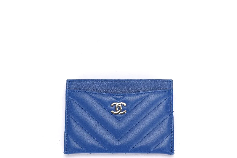 Chanel Quilted Leather Shoulder Bag for FashionistasCHANEL BLUE CHEVRON LAMBSKIN CARD HOLDER (2716xxxx), GHW, WITH CARD, DUST COVER & BOX