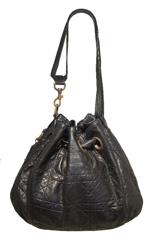 Christian Dior Saddle bags with a patent leather finish for a shiny lookChristian Dior Black Leather Cannage Drawstring Shoulder Bag