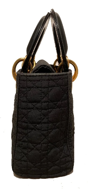 Christian Dior bags with a quilted pattern and gold - toned hardwareChristian Dior Black Nylon Mini Lady Dior Bag