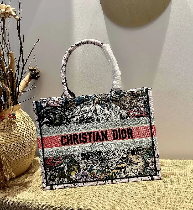 Christian Dior bags with a side - pocket for holding a water bottleChristian Dior Small Book Tote Bag